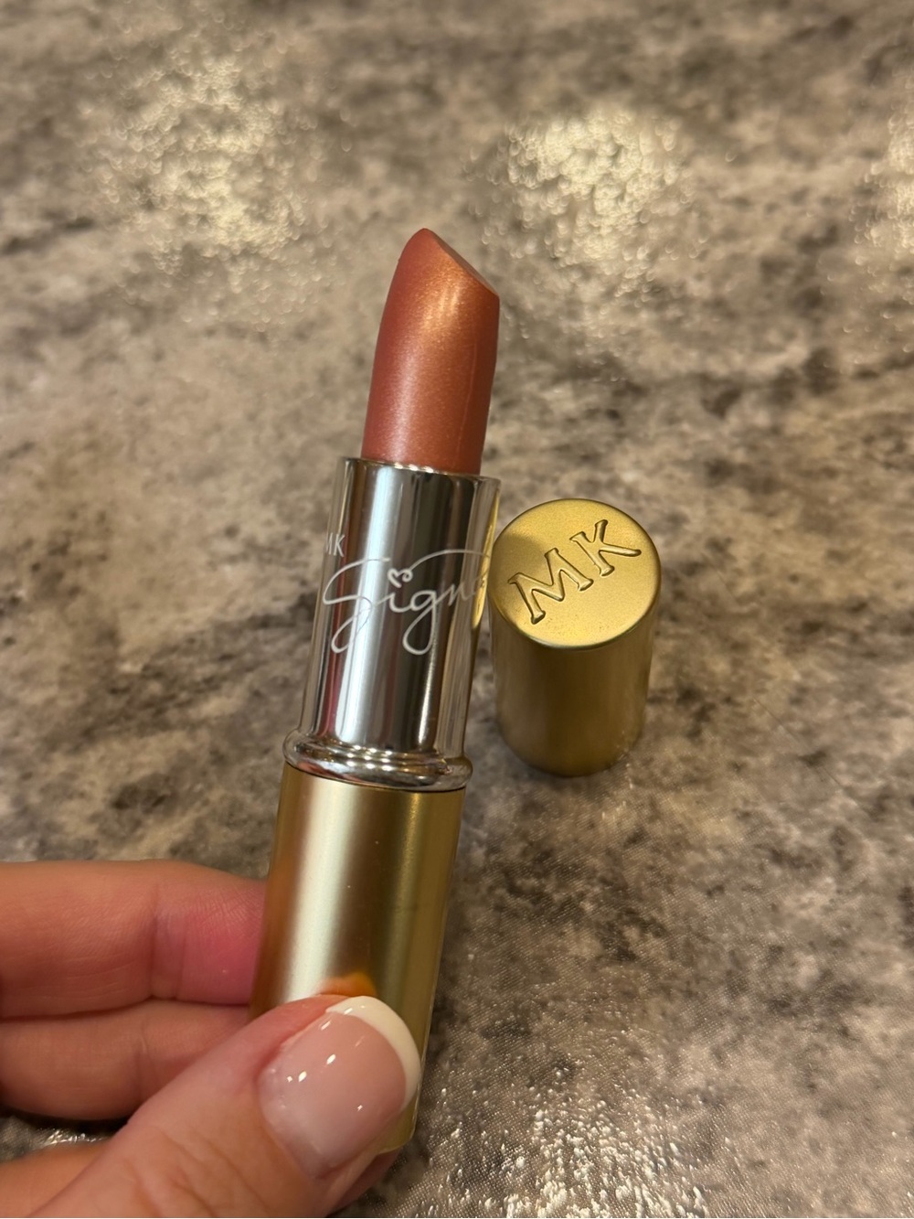 Mary Kay lipstick in the shade Juicy Peach